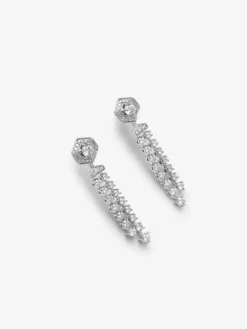 Pendientes de oro blanco de 18K con diamantes en talla brillante con un total de 1,25 cts y diamantes en talla baguette de 0,1 cts