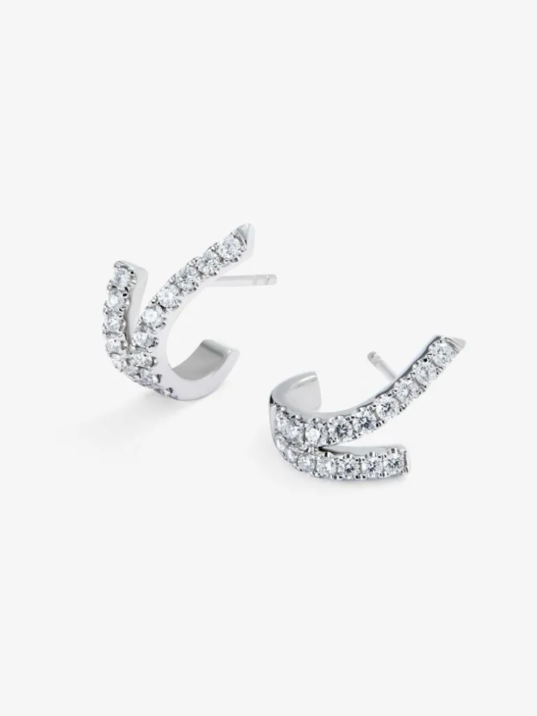 Pendientes de oro blanco de 18K con 32 diamantes en talla brillante con un total de 0,56 cts