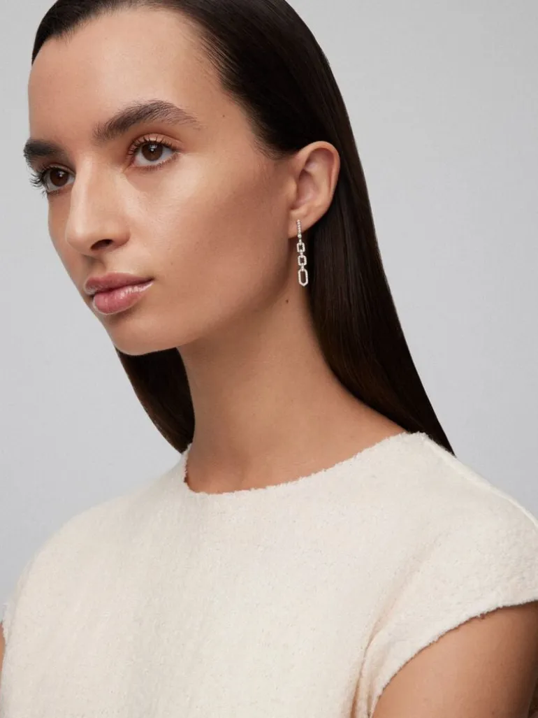 Pendientes de oro blanco de 18K con 96 diamantes en talla brillante con un total de 0,58 cts
