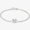 Pulsera cadena con inicial de oro blanco de 18K y diamantes