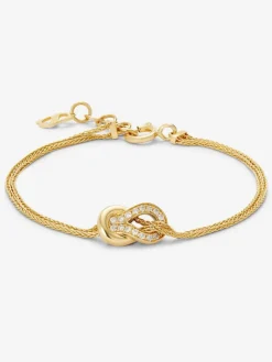 Pulsera de oro amarillo de 18K con 17 diamantes en talla brillante con un total de 0,15 cts y forma de nudo