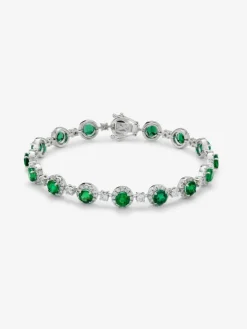 Pulsera de oro blanco de 18K con 16 esmeraldas en talla brillante con un total de 5,58 cts y 208 diamantes en talla brillante con un total de 2,73 cts