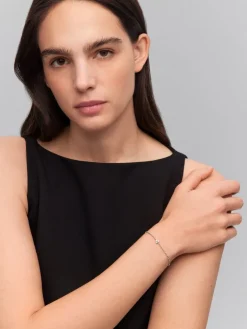 Pulsera de oro blanco de 18K con diamantes blancos en talla brillante de 0,18 cts