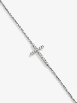 Pulsera de oro blanco de 18K con cruz de diamantes en talla brillante de 0,17 cts