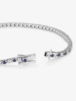 Pulsera de oro blanco de 18K con 37 diamantes en talla brillante con un total de 0,88 cts y 38 zafiros azules en talla brillante con un total de 0,95 cts