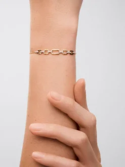Pulsera de oro blanco y amarillo de 18K con diamantes blancos en talla brillante de 0,12 cts