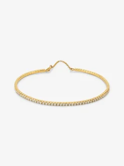 Pulsera rígida de oro amarillo de 18K con 42 diamantes en talla brillante con un total de 0,75 cts