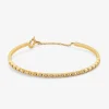 Pulsera r&iacute;gida de oro amarillo de 18K con 21 diamantes en talla brillante con un total de 0,29 cts