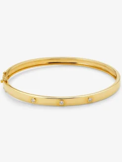Pulsera rígida de oro amarillo de 18K con diamantes blancos en talla brillante de 0,13 cts