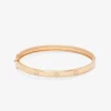 Pulsera r&iacute;gida de oro rosa de 18K con diamantes blancos en talla brillante de 0,13 cts