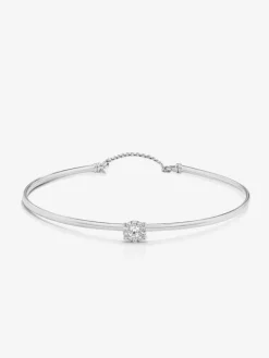 Pulsera rígida de oro blanco de 18K con 11 diamantes en talla brillante con un total de 0,2 cts