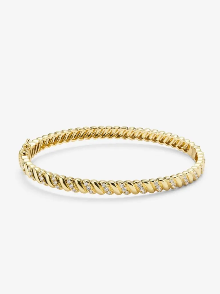 Pulsera rígida de oro amarillo de 18K con diamantes blancos en talla brillante de 0,58 cts