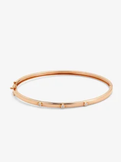 Pulsera rígida de oro rosa de 18K con diamantes en talla brillante de 0,07 cts
