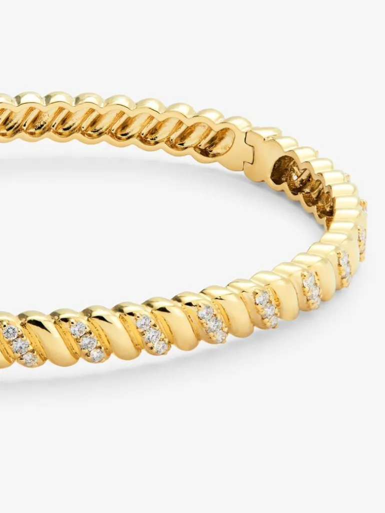 Pulsera rígida de oro amarillo de 18K con diamantes blancos en talla brillante de 0,58 cts