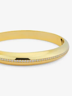 Pulsera r&iacute;gida de oro amarillo de 18K con pavé de diamantes en talla brillante
