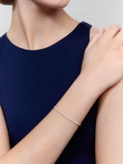 Pulsera rígida de oro rosa de 18K con 42 diamantes blancos en talla brillante con un total de 0,75 cts