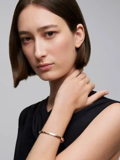 Pulsera rígida de oro rosa de 18K con diamantes blancos en talla brillante de 0,13 cts