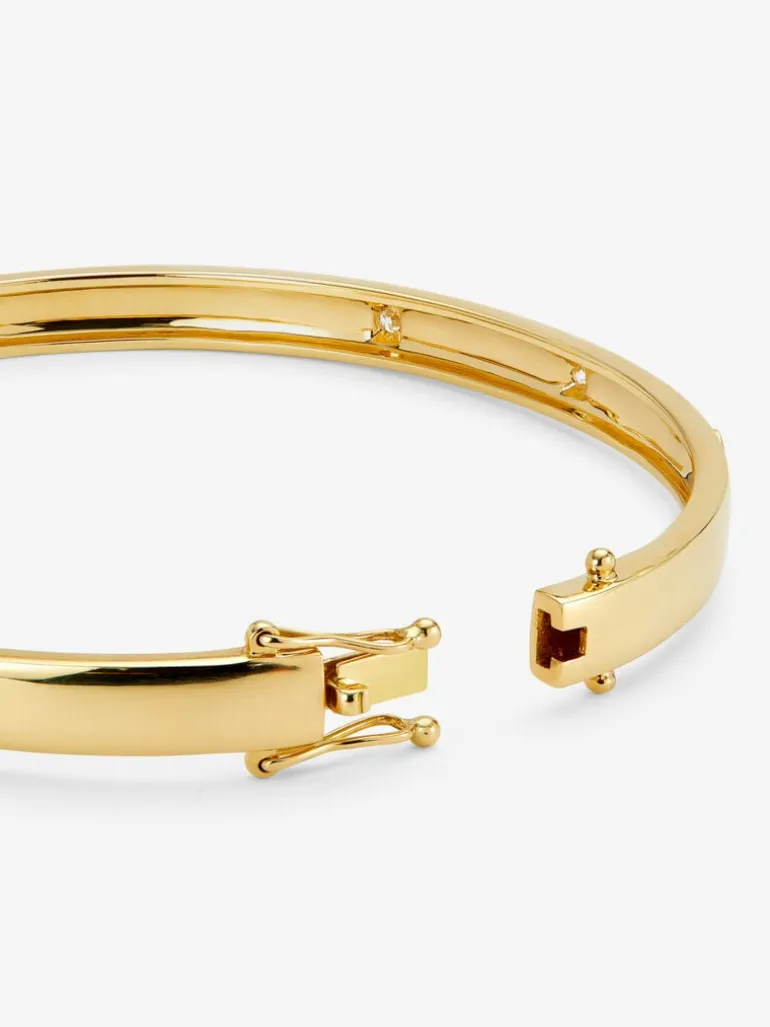 Pulsera rígida de oro amarillo de 18K con diamantes blancos en talla brillante de 0,13 cts