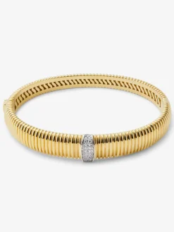 Pulsera rígida gallonada de oro blanco y amarillo de 18K con pavé de diamantes en talla brillante con un total de 0,16 cts