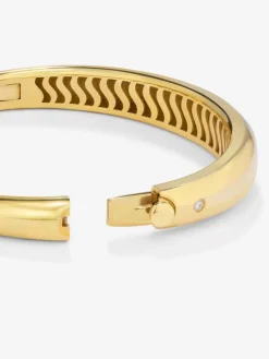 Pulsera rígida lisa de oro amarillo de 18K con diamante