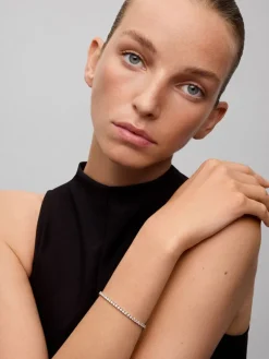 Pulsera rivière de oro blanco de 18K con 60 diamantes en talla brillante con un total de 4,7 cts