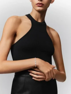 Pulsera rivière de oro blanco de 18kt con motivos geométricos