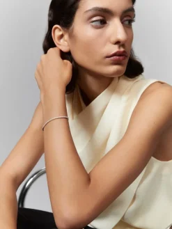 Pulsera rivière de oro blanco de 18K con diamantes en talla brillante de 0,09 cts